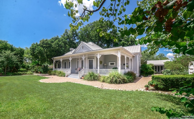 view of front of house featuring a front yard and a porch