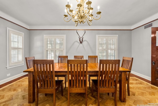 dining space featuring visible vents, crown molding, and baseboards