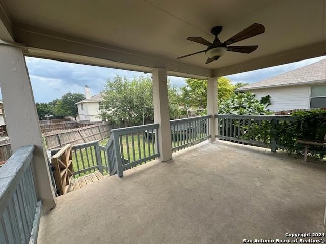 view of patio / terrace featuring ceiling fan