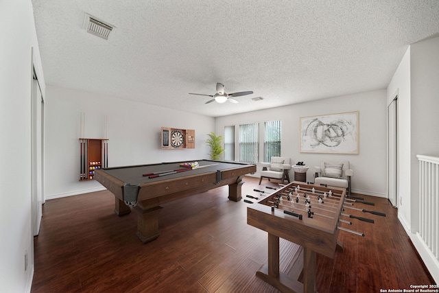 recreation room with ceiling fan, dark hardwood / wood-style flooring, pool table, and a textured ceiling