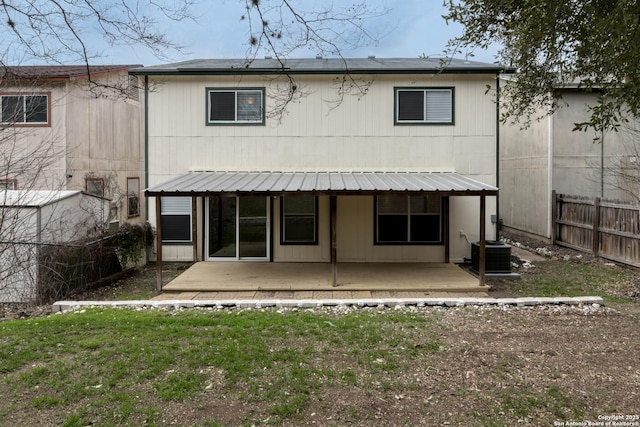 back of house with a patio area, a yard, cooling unit, and fence