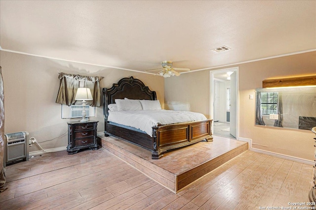 bedroom featuring ceiling fan and wood-type flooring