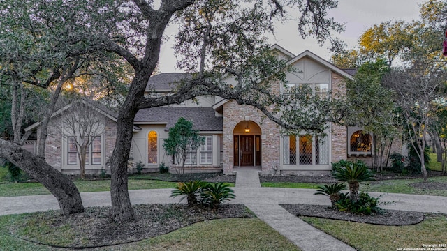 view of front of property with a front lawn