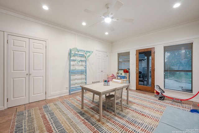 tiled office featuring ceiling fan and crown molding