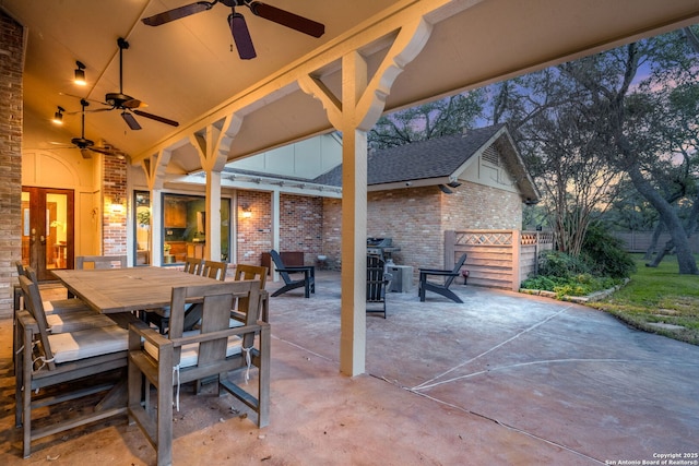 patio terrace at dusk with ceiling fan