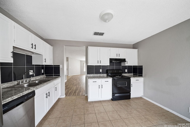 kitchen featuring black range with electric stovetop, dishwasher, white cabinets, light tile patterned flooring, and sink