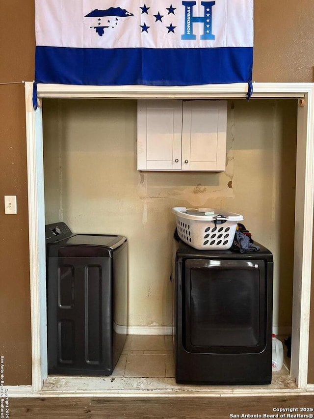 laundry room with washer and clothes dryer