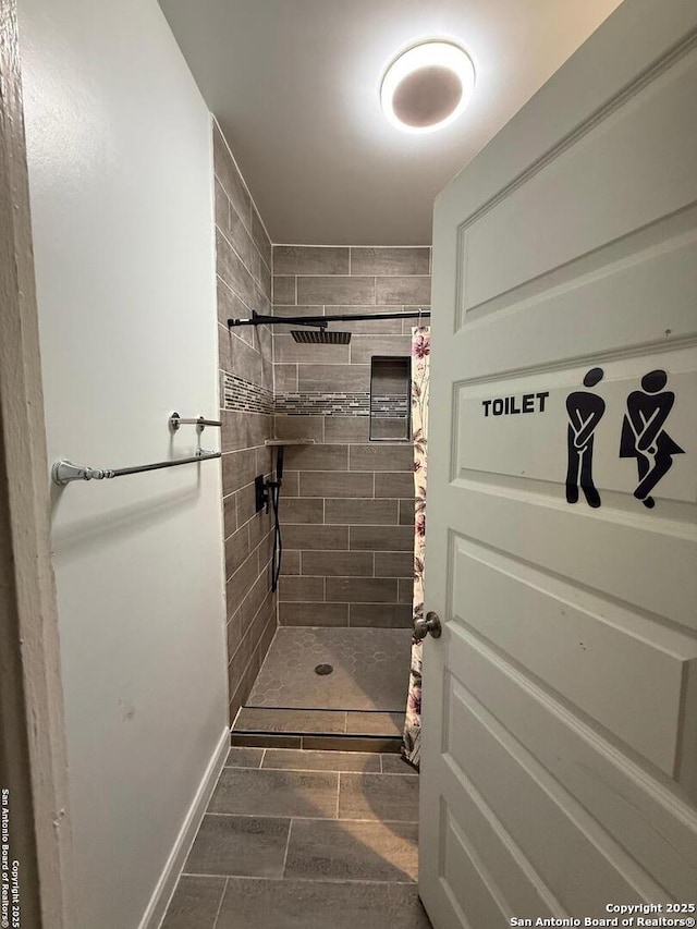 bathroom featuring walk in shower