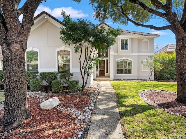 view of front of house with a front lawn