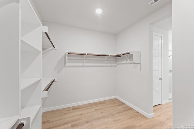 125 Connor Crk, San Antonio, TX 78253 - walk in closet with wood finished floors