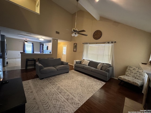 living room featuring high vaulted ceiling, beamed ceiling, ceiling fan, and wood-type flooring