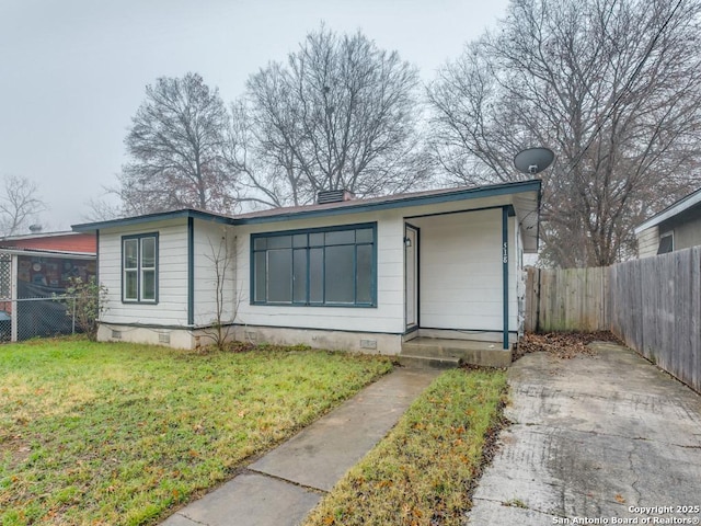 ranch-style house with a front yard