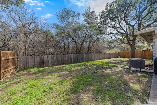 view of yard featuring central AC