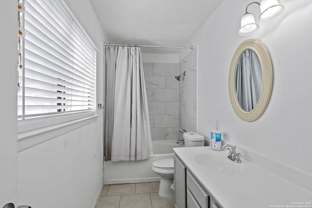 full bathroom with tile patterned flooring, toilet, a textured ceiling, shower / bath combo with shower curtain, and vanity