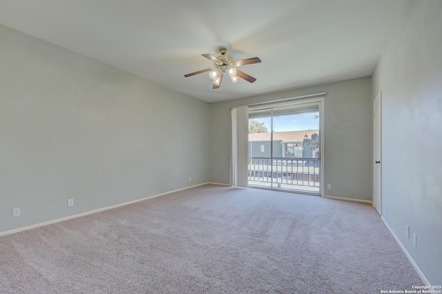 unfurnished room featuring light carpet, a ceiling fan, and baseboards