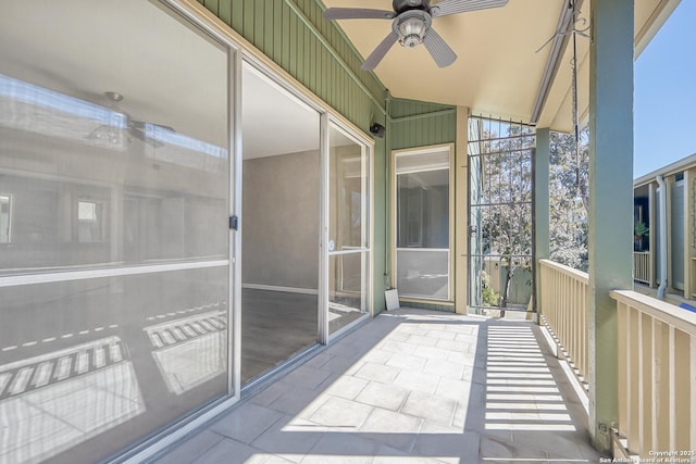 balcony featuring a ceiling fan