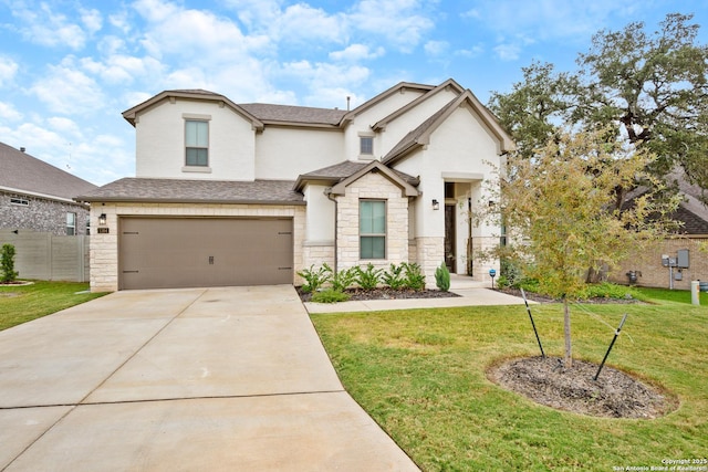 view of front facade featuring a front lawn and a garage