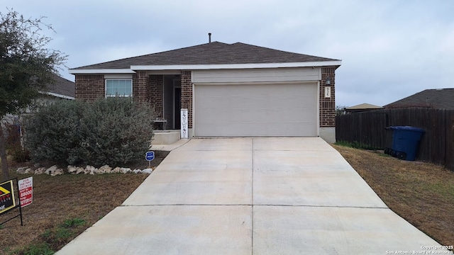 ranch-style house featuring a garage