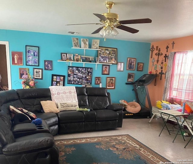 living room featuring ceiling fan