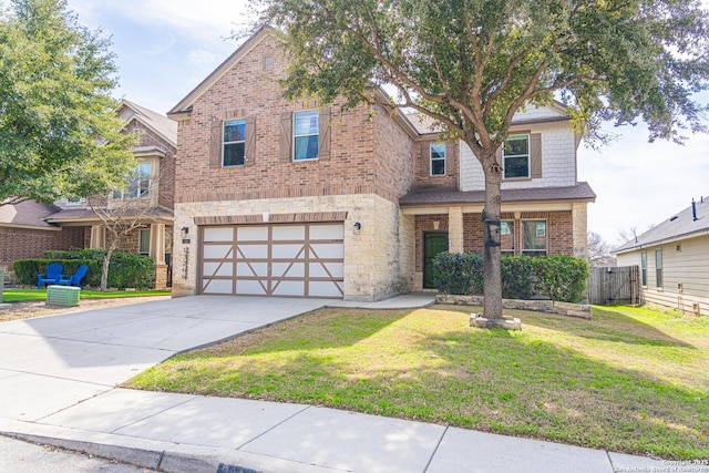 view of front of home featuring a front lawn and a garage