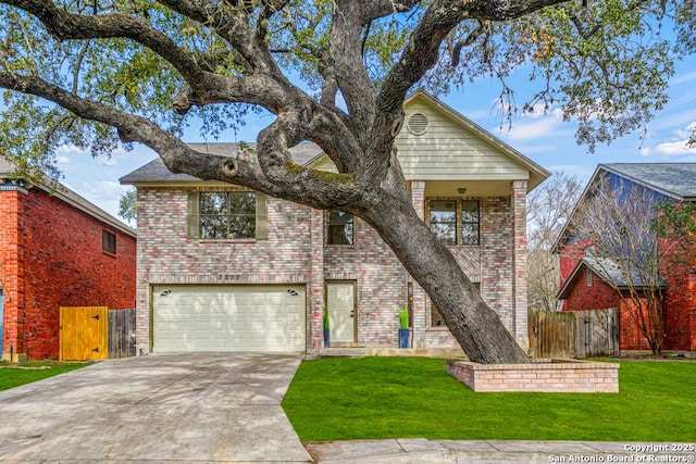 view of front of home with a garage and a front yard