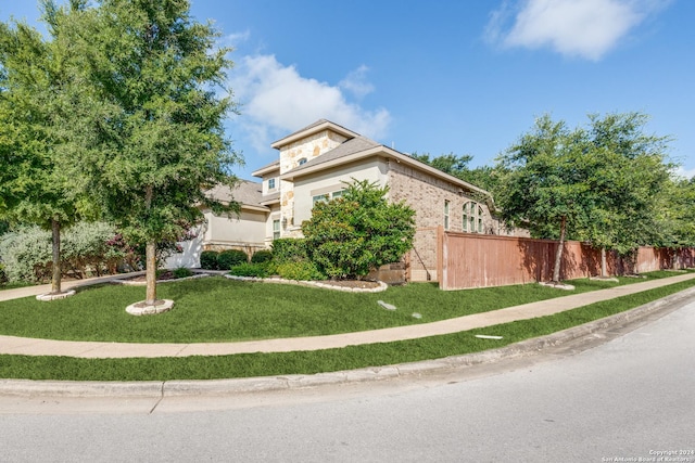 view of front facade with a front lawn