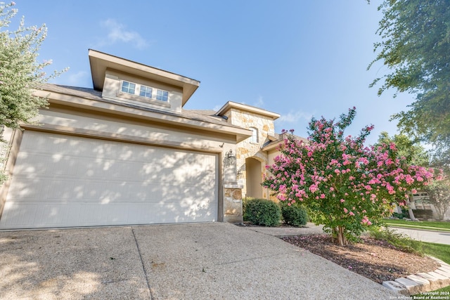 view of front of home with a garage