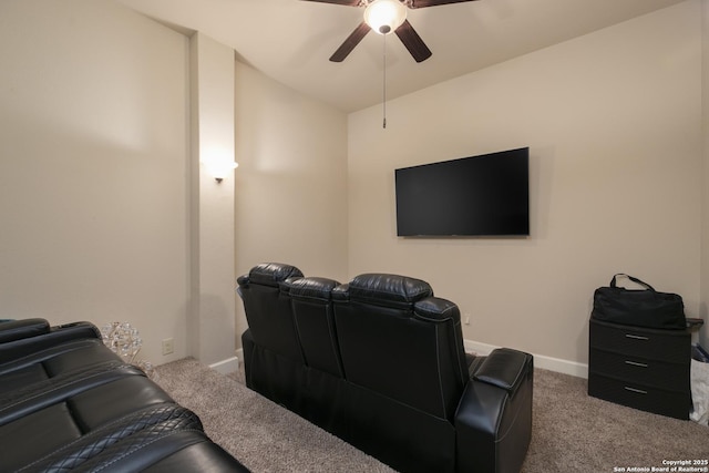 cinema room with carpet and ceiling fan