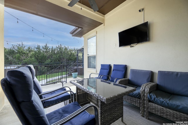 view of patio / terrace featuring ceiling fan