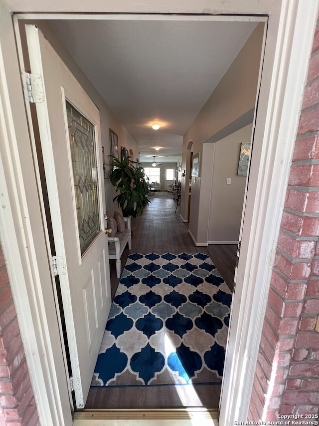 hallway featuring hardwood / wood-style flooring