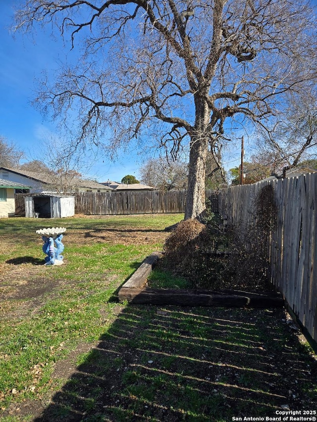 5550 Aspen Vly, San Antonio, TX 78242 - fenced backyard with a storage shed