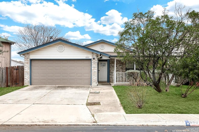 ranch-style house featuring a garage and a front lawn