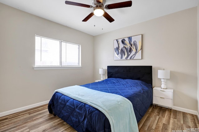 8907 Athens, San Antonio, TX 78251 - bedroom with ceiling fan and wood-type flooring