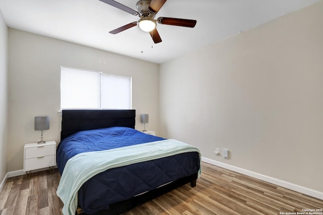 8907 Athens, San Antonio, TX 78251 - bedroom with hardwood / wood-style floors and ceiling fan