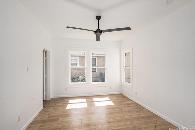 1645 W Magnolia Ave, San Antonio, TX 78201 - spare room with light wood finished floors, a ceiling fan, and baseboards