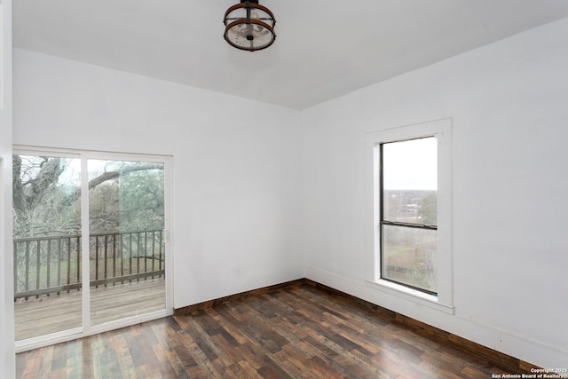 empty room featuring dark hardwood / wood-style floors