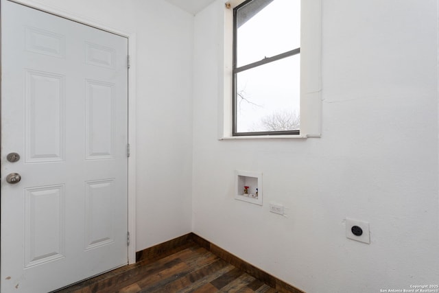 washroom with hookup for an electric dryer, washer hookup, and dark hardwood / wood-style flooring