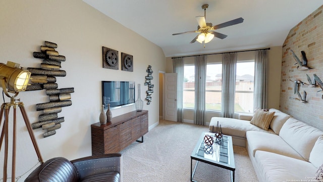 carpeted living room featuring lofted ceiling and ceiling fan