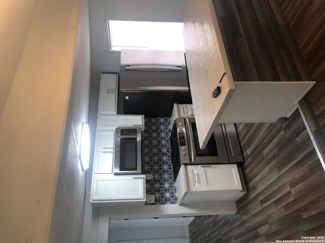 kitchen featuring white cabinets