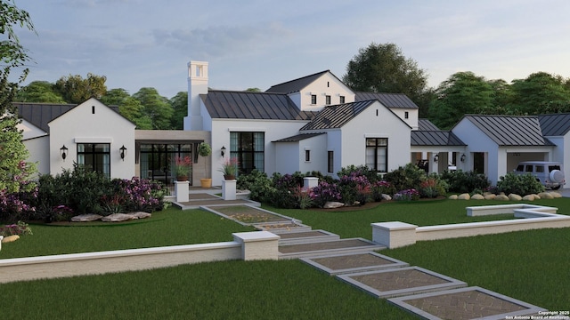 modern inspired farmhouse featuring a front yard