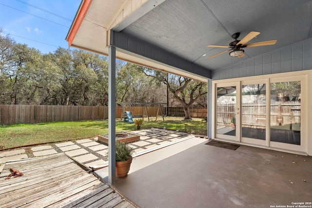 exterior space featuring vaulted ceiling and a ceiling fan