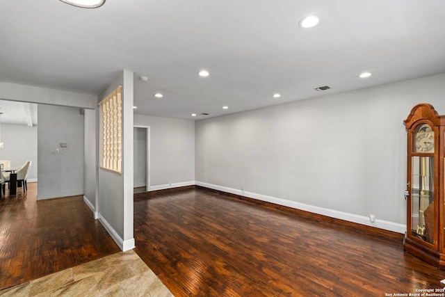 interior space with recessed lighting, visible vents, baseboards, and wood finished floors