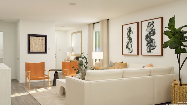 living room with light hardwood / wood-style flooring and a wealth of natural light