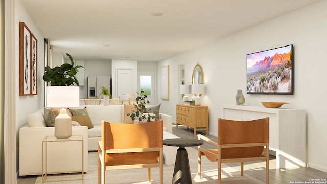 sitting room featuring hardwood / wood-style floors