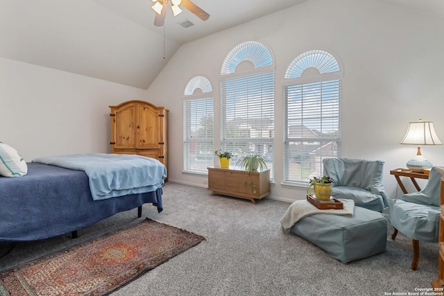 bedroom with high vaulted ceiling, ceiling fan, and carpet flooring