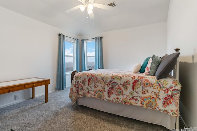 bedroom with ceiling fan and carpet floors