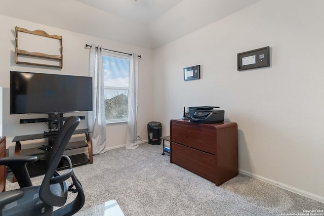 carpeted office space with lofted ceiling