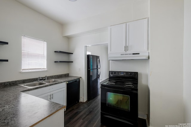 kitchen featuring dark hardwood / wood-style flooring, sink, white cabinetry, and black appliances