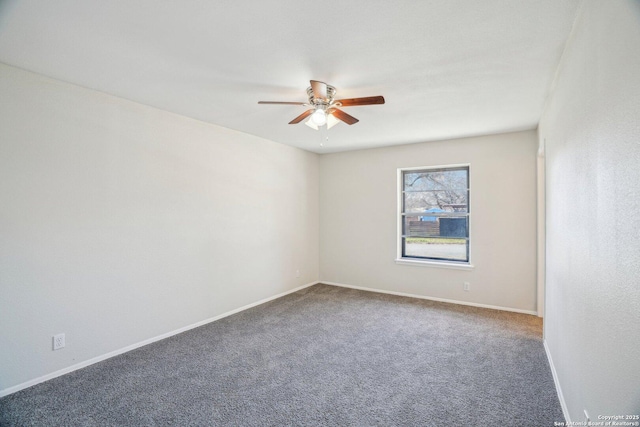 carpeted empty room featuring ceiling fan