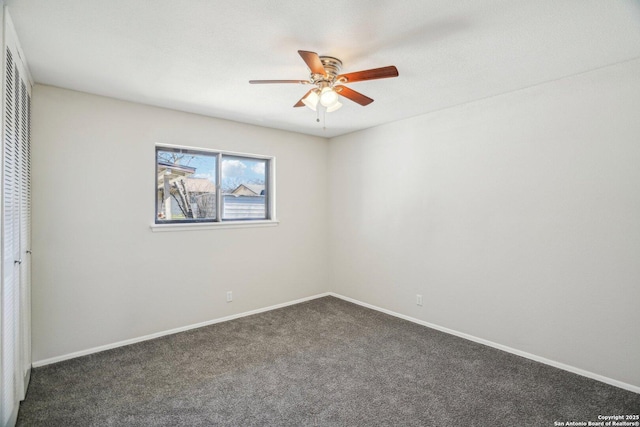 carpeted empty room with ceiling fan